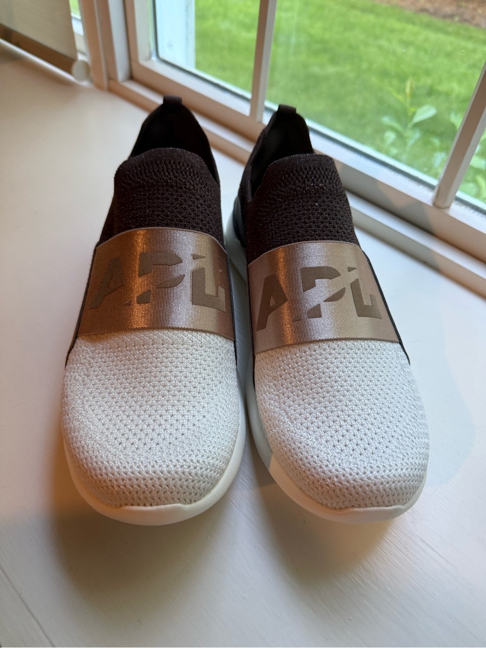 APL Slip-On Knit Sneakers in White, Black & Metallic Gold